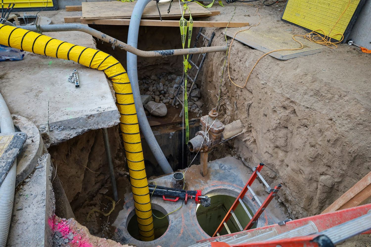A Triplex crew working an open structure on an active jobsite