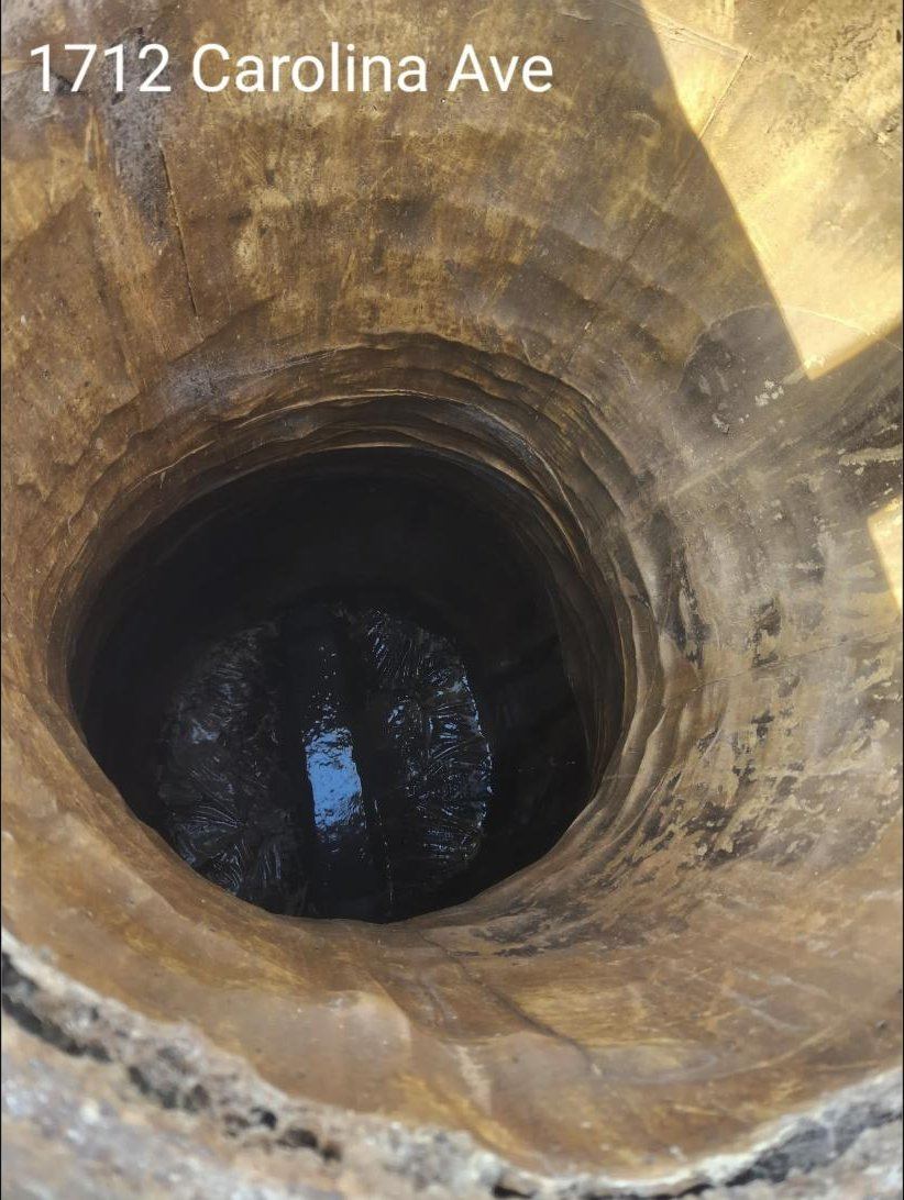 A Lynn Haven manhole lined in the 1990s, photographed decades later